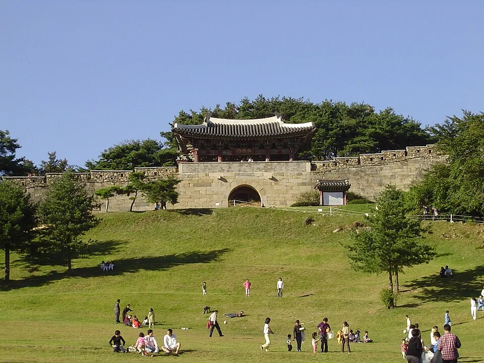 The historic fortress gate above a green hillside at Sangdangsanseong in Cheongju