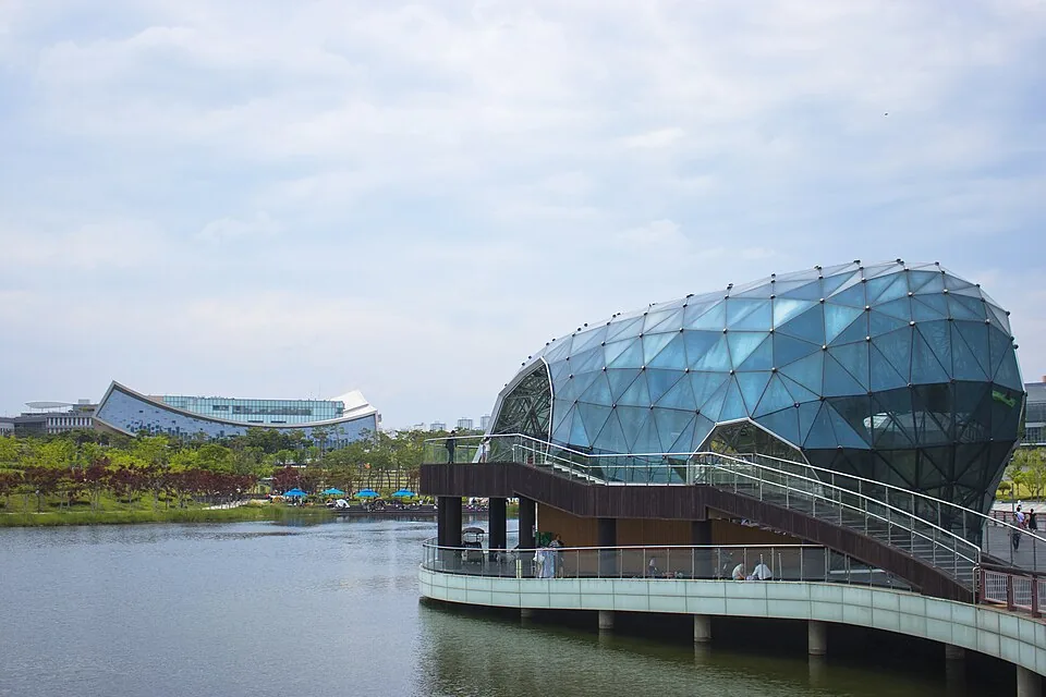 The lakeside pavilion and water at Sejong Lake Park