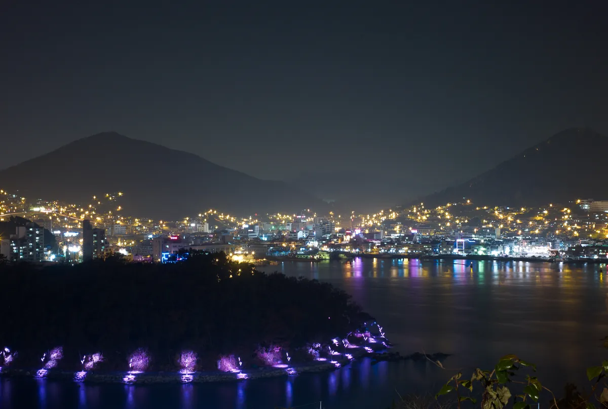 Lights across Yeosu harbor at night.
